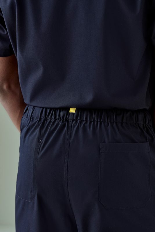 Unisex reversible scrub pant in Midnight Navy, featuring pockets and durable, comfortable fabric, ideal for healthcare or restaurant use.