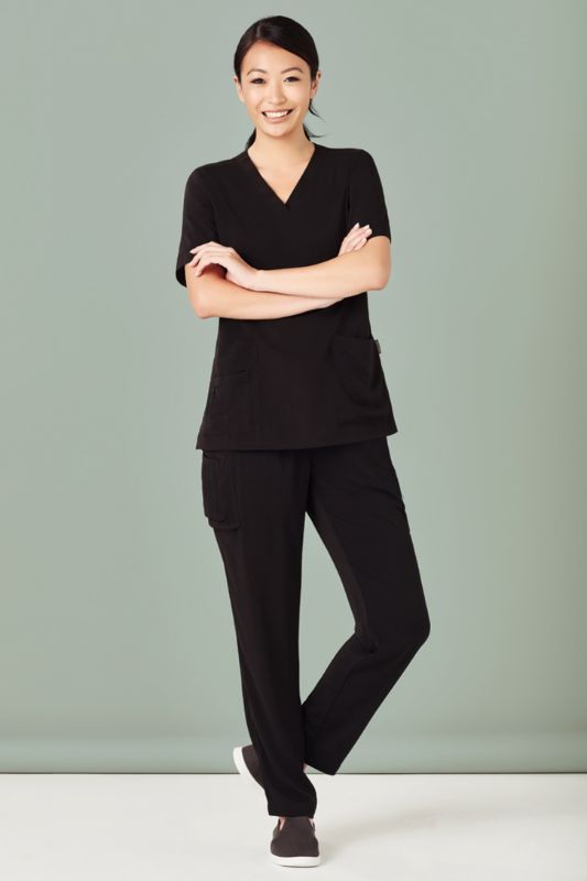 Black women's scrub pants with a tapered leg, multiple pockets, and moisture-wicking fabric, size XXS.