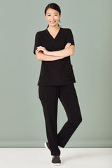 Black women's scrub pants with a tapered leg, multiple pockets, and moisture-wicking fabric, size XXS.