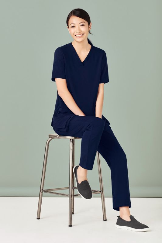 Women's Navy Avery Slim Leg Scrub Pant in XXS, featuring tapered design, multi pockets, and wicking fabric for comfort and style.