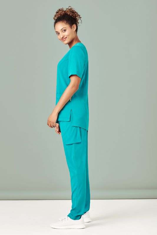 Women's teal Avery scrub pant with a tapered leg, multiple pockets, and moisture-wicking fabric, size XXS by Biz Collection.