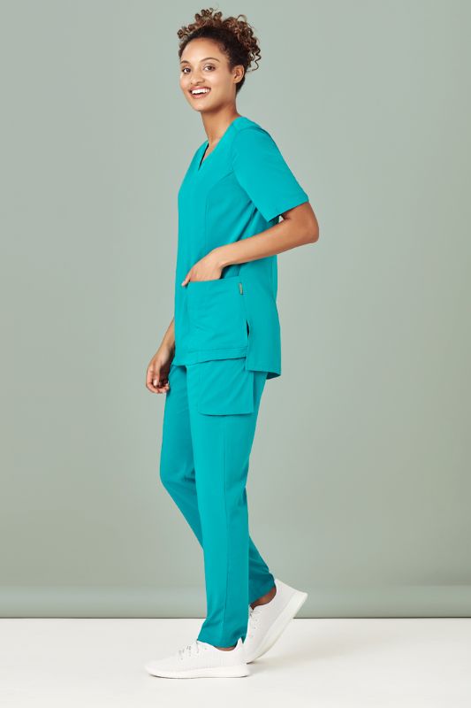 Teal women's scrub pant with tapered leg, multiple pockets, and moisture-wicking fabric, Size XXS by Biz Collection.