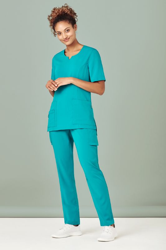 Women's teal scrub pant in size XXS with tapered leg, multi pockets, and moisture-wicking fabric for comfort and functionality.