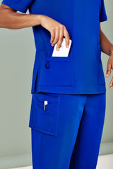 Women's Electric Blue scrub pants, size 3XL, featuring cargo pockets and a roll-up leg for versatile, practical workwear.