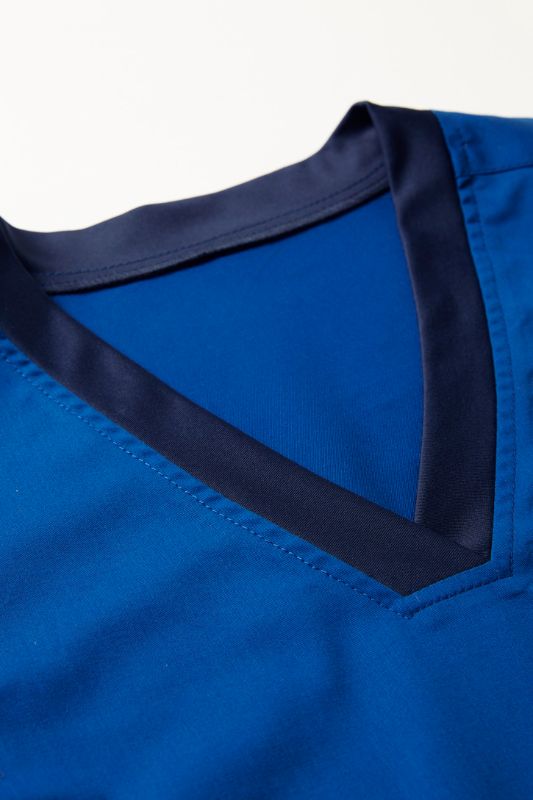 Electric Blue Women's Riley V-Neck Scrub Top in XL with antibacterial stretch side panels for comfort and mobility.