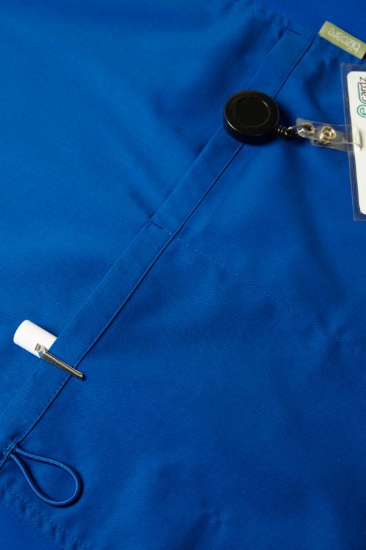 Men's Electric Blue V-Neck Scrub Top (Size XS) with antibacterial stretch side panels for comfort and movement during long shifts.