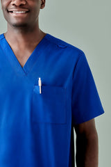 Men's Royal V-neck scrub top in XS with antimicrobial features, multiple pockets, and a tailored fit for healthcare professionals.