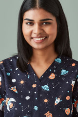 Midnight navy women's scrub top with a playful space print, perfect for veterinarians and educators in a comfortable cotton fabric.