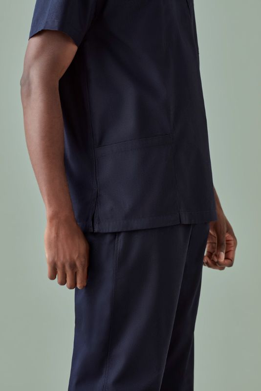 Unisex reversible scrub top in Midnight Navy (XXS) with chest and back pockets, ideal for healthcare professionals.