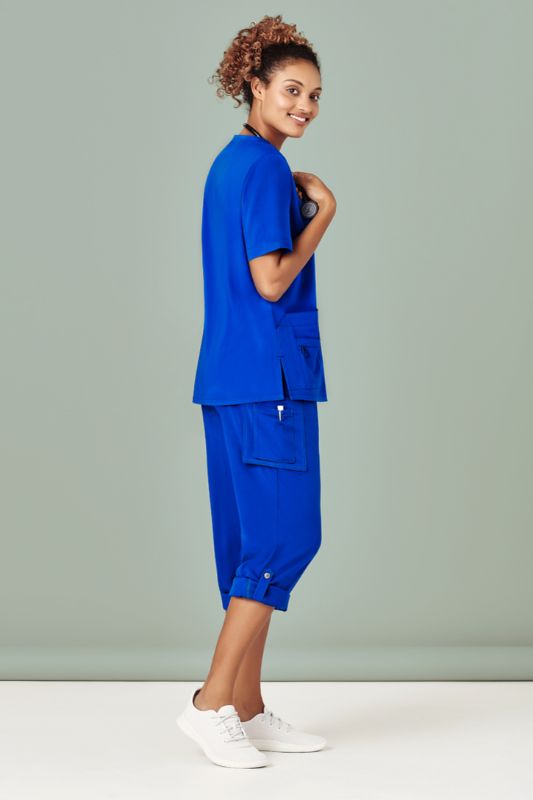 Electric Blue women's V-neck scrub top featuring pockets, utility loops, and a moisture-wicking fabric for healthcare professionals.