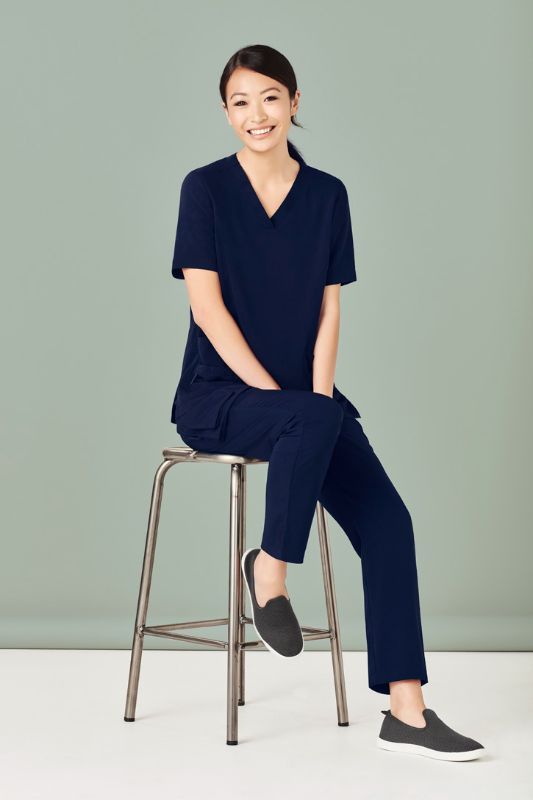 Women's Navy Avery V-Neck Scrub Top in Size L, featuring a stylish design, multiple pockets, and comfortable wicking fabric.