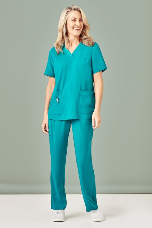 Teal V-neck scrub top for women in size 4XL, featuring multiple pockets and a comfortable fit, perfect for healthcare professionals.