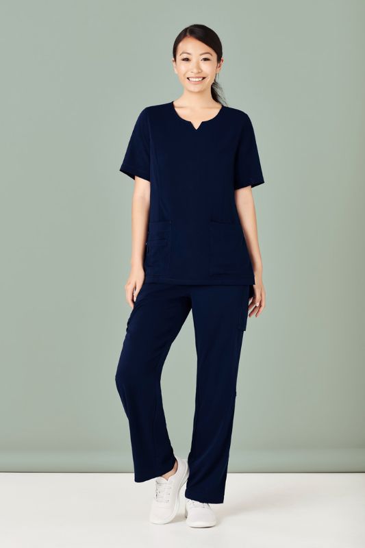 Women's Navy scrub top with round neck, tailored fit, moisture-wicking fabric, multiple pockets, and easy-care design.