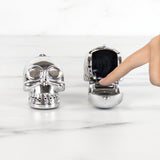 Set of 4 dark humor lip balms with flavors like 'Midnight Cocoa' for soft, hydrated lips and a playful twist.