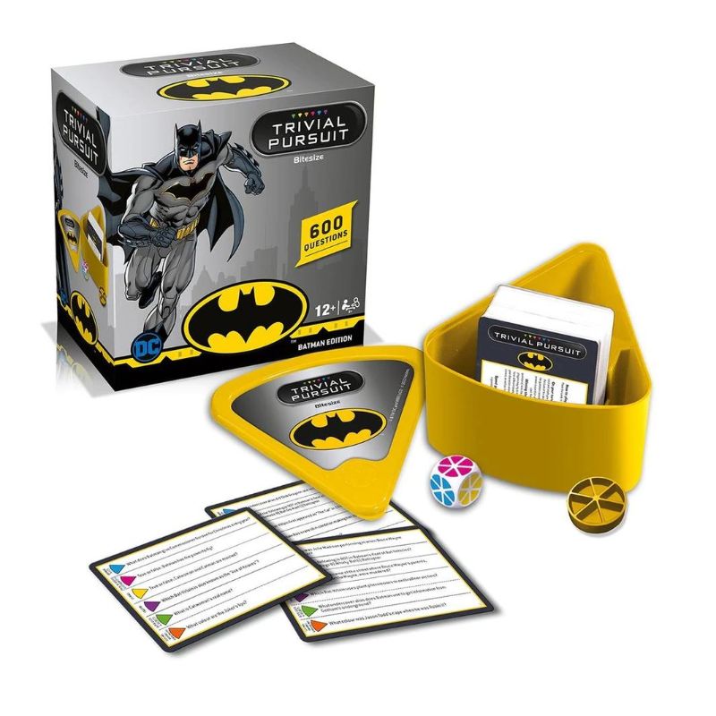 Trivia game Trivial Pursuit - Batman in a yellow wedge case; test your knowledge of Gotham's heroes and villains with 600 questions.