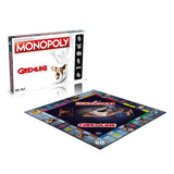 Monopoly - Gremlins edition board game features iconic locations and whimsical inventions from the beloved Gremlins universe.