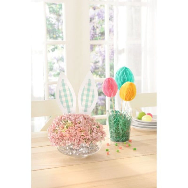 Colorful Easter centerpiece picks featuring honeycomb eggs and bunny ears, perfect for festive table decoration.