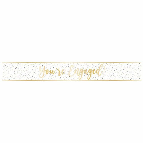 Gold foil engagement banner measuring 2.7m, perfect for adding glamour to your celebration and photo backdrops.