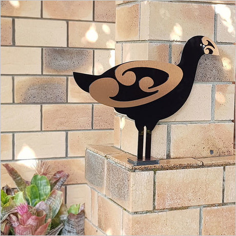 Freestanding 2 Tone Moko Pukeko sculpture in Black & Brushed Copper, perfect for enhancing outdoor gardens and landscapes.