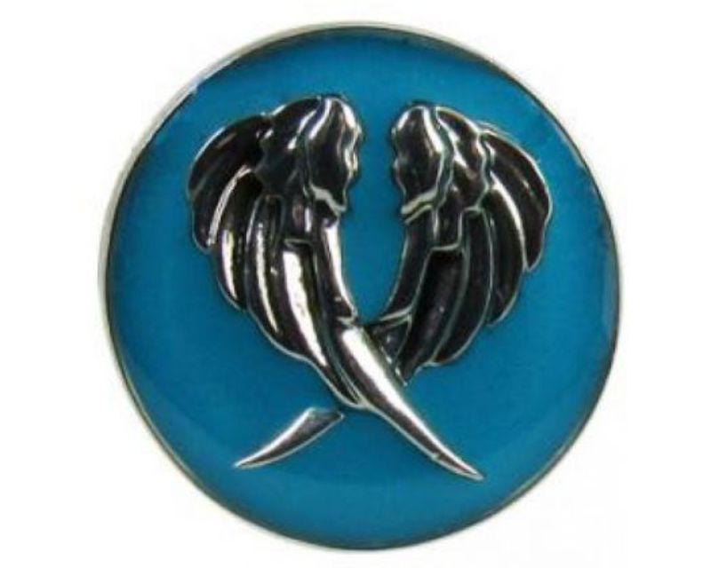 Teal angel wings snap accessory featuring intricate detailing, perfect for adding a unique touch to any outfit.
