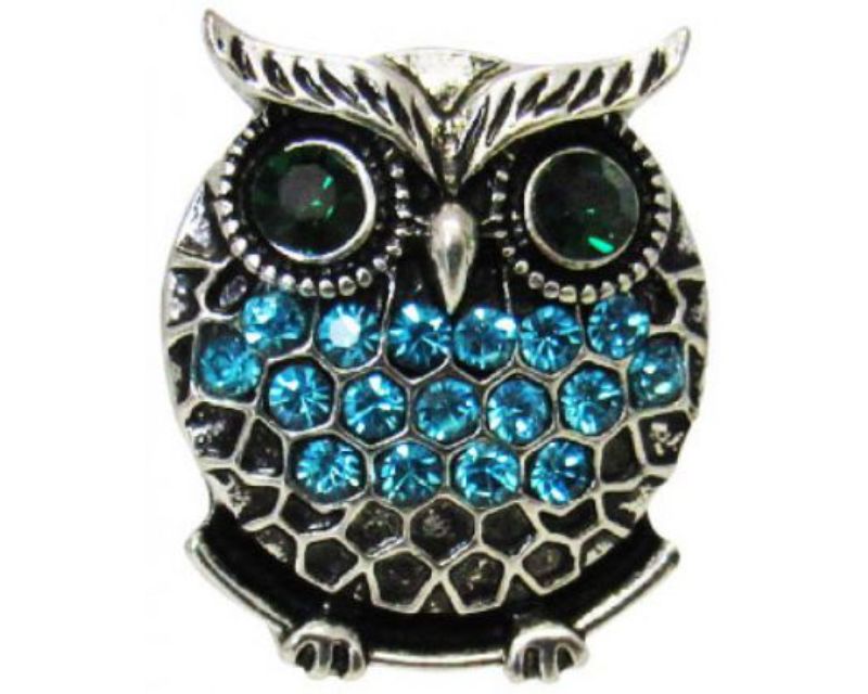 Owl charm adorned with sparkling blue diamantes, perfect for enhancing your jewelry collection and style.