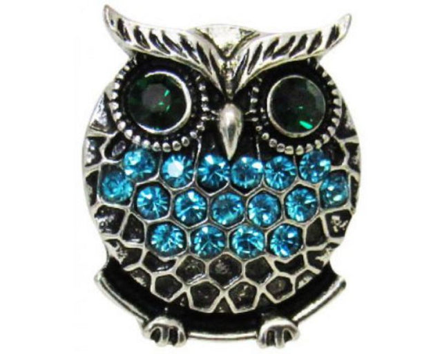 Owl charm adorned with sparkling blue diamantes, perfect for enhancing your jewelry collection and style.