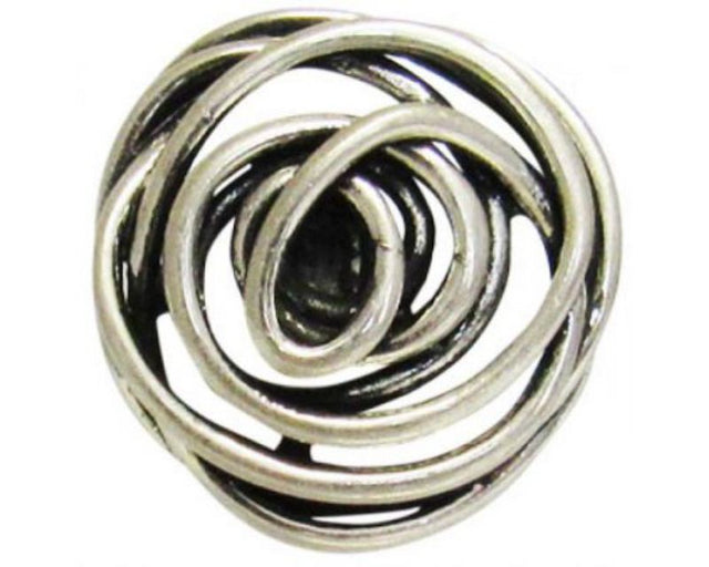 Antique silver flower snap jewelry with intricate detailing for versatile styling and comfortable wear.