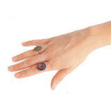 Set of 24 colorful mood rings featuring dreamcatcher, hamsa, mandala, and pentacle designs that change with body temperature.