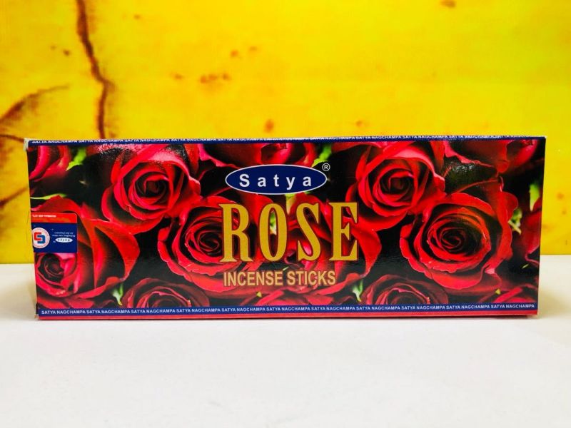 Box of 6 Satya Hexa Rose Incense rolls, featuring 120 fragrant sticks for meditation and relaxation with a soothing rose aroma.