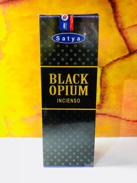 Box of 6 Satya Hexa Black Opium incense rolls, each with 20 sticks, offering a rich, sweet, and spicy fragrance for relaxation.