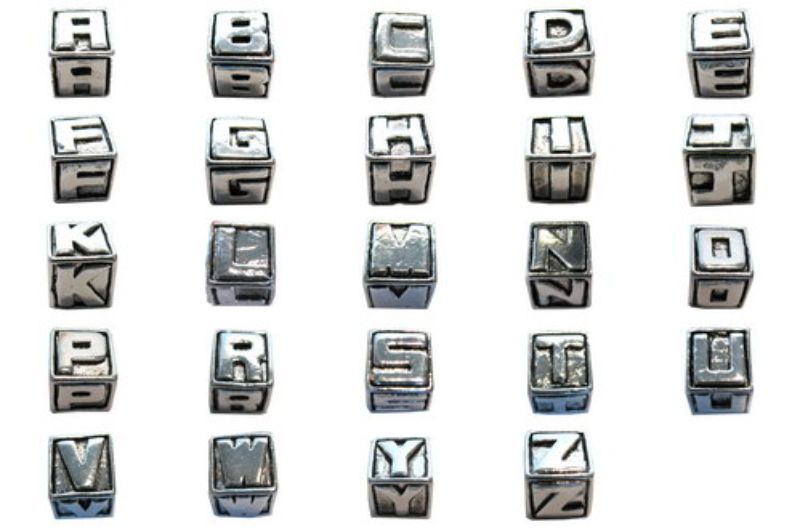 Vibrant Alphabet Starter Pack with 50 durable beads for personalized jewelry and crafts, ideal for all ages.