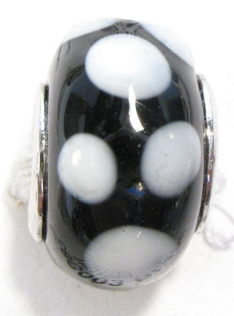 Handmade black glass beads with white dots, versatile 4-piece set for elegant jewelry crafting.