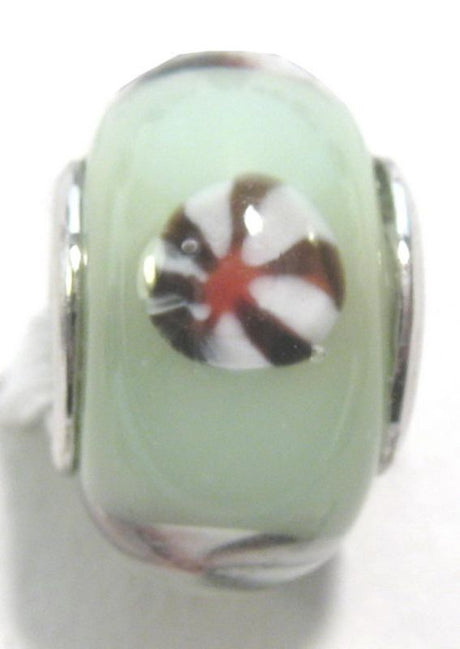 Handmade glass beads in vibrant colors, featuring rhodium plated interiors, ideal for DIY jewelry projects.
