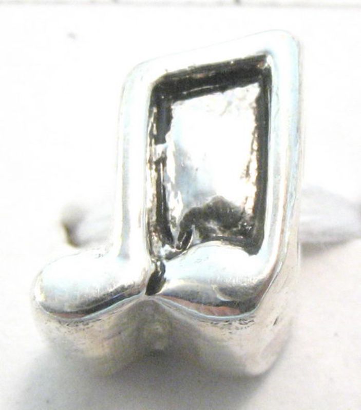 Silver-plated musical note beads in a pack of 8, perfect for jewelry making and crafts, featuring an anti-tarnish coating.