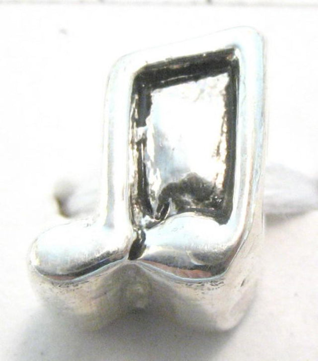 Silver-plated musical note beads in a pack of 8, perfect for jewelry making and crafts, featuring an anti-tarnish coating.