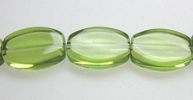Bright green 11mm flat oval glass beads, 32 pieces per set, perfect for jewelry making and DIY crafts. Set of 2.