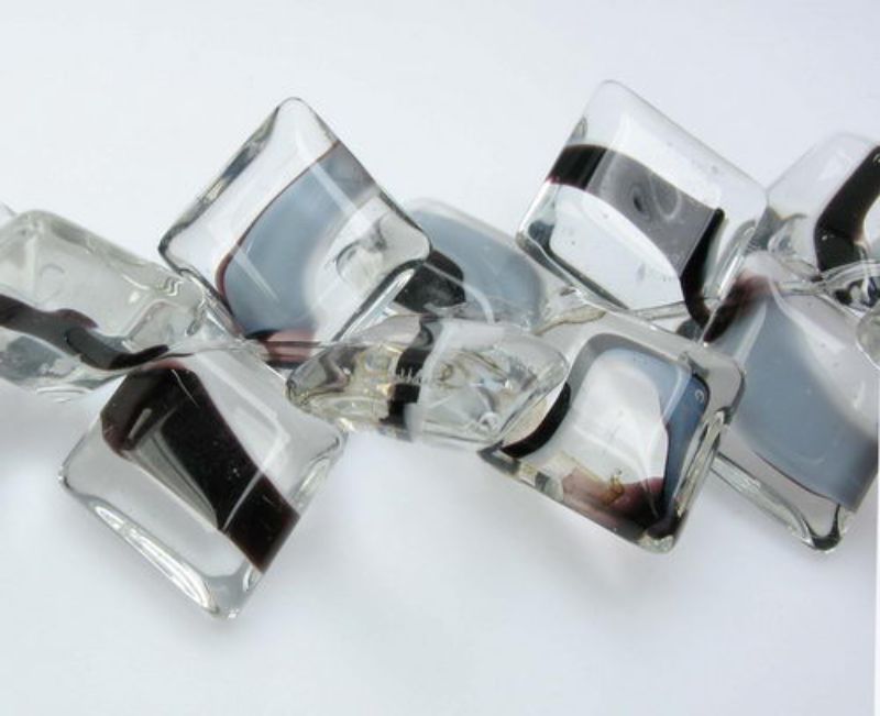 Set of 3 unique 16x28mm glass beads in tooth shape, perfect for elegant jewelry making and creative crafting.