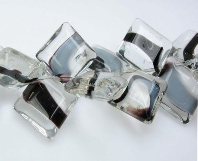 Set of 3 unique 16x28mm glass beads in tooth shape, perfect for elegant jewelry making and creative crafting.