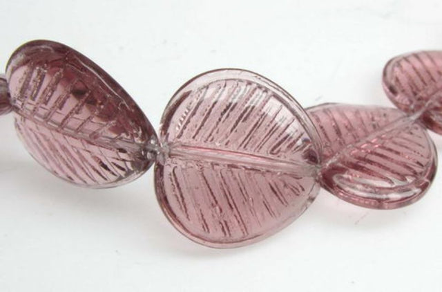 Vibrant 16x16mm leaf-shaped glass beads set of 10, perfect for crafting unique jewelry and nature-inspired designs.
