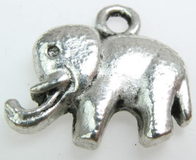 Set of 9 antique silver elephant metal beads, perfect for adding charm to handmade jewelry and accessories.
