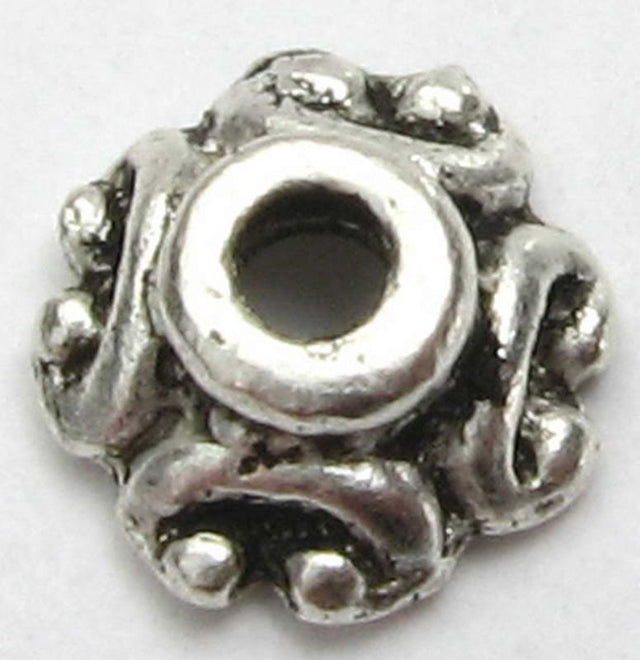 Set of 2 metal beads, 6.5mm, 100pcs each, ideal for jewelry making and DIY projects with a stunning metallic finish.