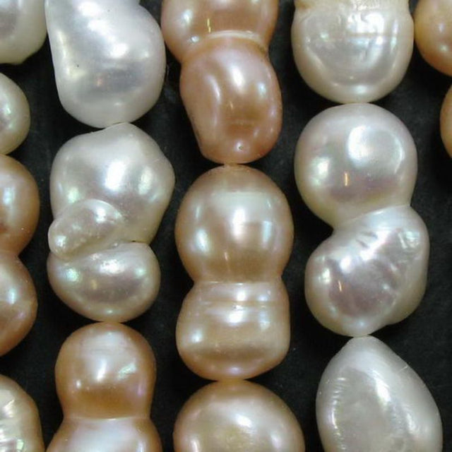 Elegant pearl beads measuring 10.7x6.6mm on a 40cm strand, perfect for creating stunning jewelry designs. Set of 3.