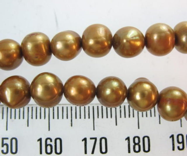 Set of 2 exquisite Freshwater Brown Pearls, ideal for elegant jewelry-making projects with unique natural variations.