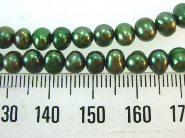 Set of 2 Freshwater Green Pearl Beads, showcasing iridescent luster and vibrant green for elegant jewelry designs.