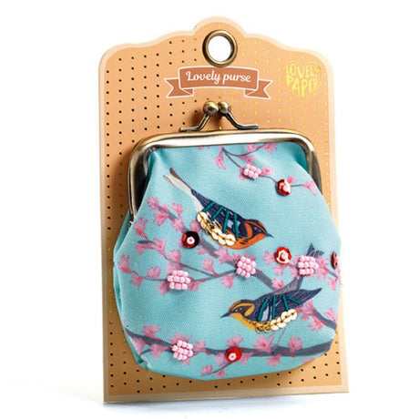 Colorful Djeco Lovely Purse featuring charming bird illustrations, perfect for kids' adventures and organizing treasures.