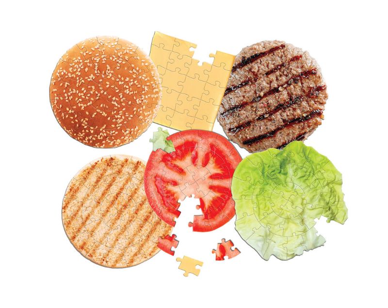 Colorful jigsaw puzzle of a 6-layer cheeseburger by Pikkii, designed for fun and creativity in a charming burger box.