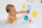 Vibrant flower-shaped bath puzzle pieces in soft foam for creative play, enhancing fine motor skills during bath time.