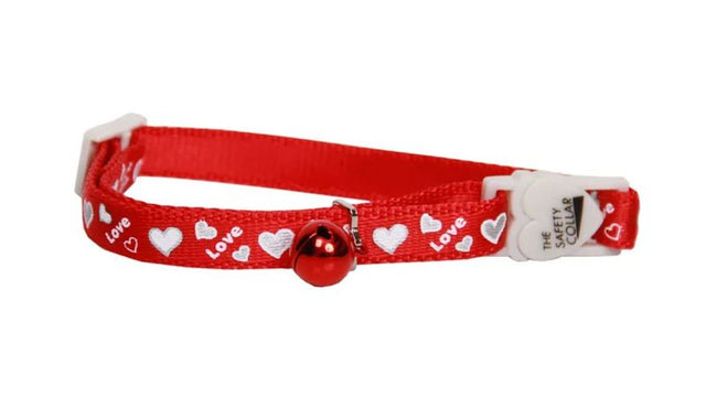 Red reflective cat collar with love heart pattern, adjustable fit, safety bell, and break-away clip for safety.