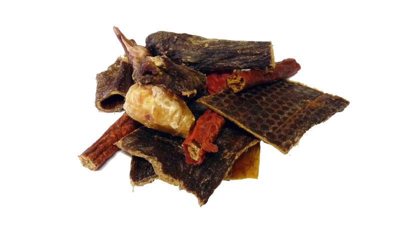 A mixed bag of nutritious dog chews, promoting oral health and satisfying natural chewing habits for dogs of all sizes.