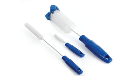 Cleaning kit for PetSafe Drinkwell fountains, featuring a flared sponge and specialized brushes for hard-to-reach areas.